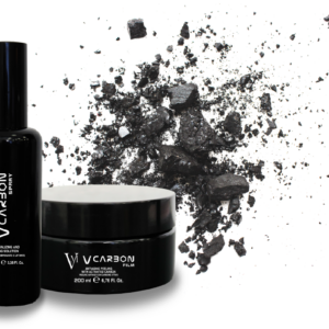A close-up image of the V Carbon System skincare kit, featuring sleek packaging and various product containers.