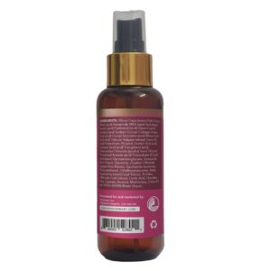 A brown bottle of HairSmart hair serum with a list of ingredients and company information on the label.