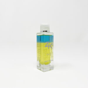 Clear bottle with dual-phase blue and yellow liquids labeled ZK FACE against a white background.