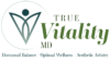 Logo of True Vitality MD featuring a stylized human figure within a circle, with the name 'TRUE Vitality MD' beside it in green font. Below the name, three phrases 'Hormonal Balance', 'Optimal Wellness', and 'Aesthetic Artistry' are listed, representing the brand's focus areas Leaders in PRP Commerce