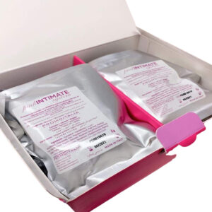An open package of Promoitallia's Pink Intimate System, an intimate skin brightening solution, with a vial, applicator, and a sealed pouch.