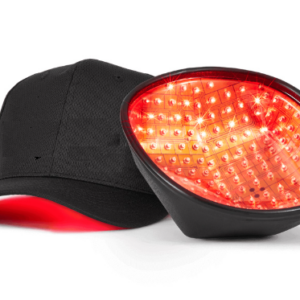 A HairSmart laser hair growth cap with red light therapy diodes illuminated inside, integrated into a black baseball cap with a red underside brim.